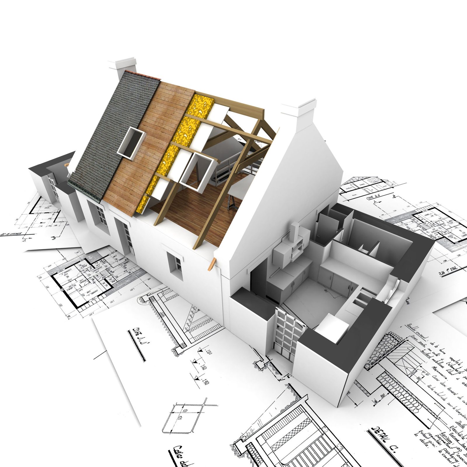 Architectural cut-away model resting on construction drawings