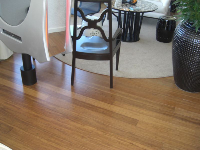Lobby lounge with wide plank hardwood flooring