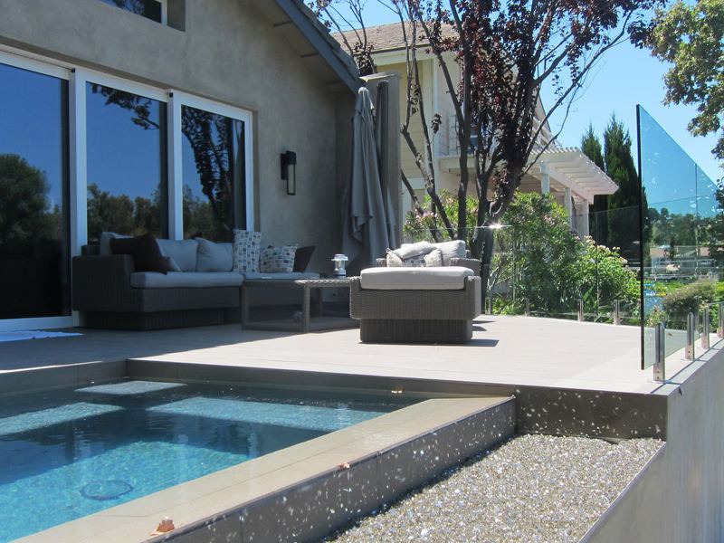 Contemporary pool terrace and glass wall